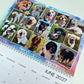 A spiral-bound 2027 desk calendar page featuring a grid of custom pet photos of dogs, with 'JUNE 2027' printed on the calendar section below.