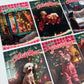 A set of Christmas greeting cards featuring dogs. The cards display festive holiday scenes and text like 'Happy Christmas', 'Merry Christmas', and 'Seasons Greetings' with various dogs dressed in holiday attire or posed in front of Christmas decorations.